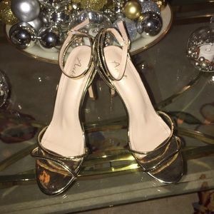 Gold high heels